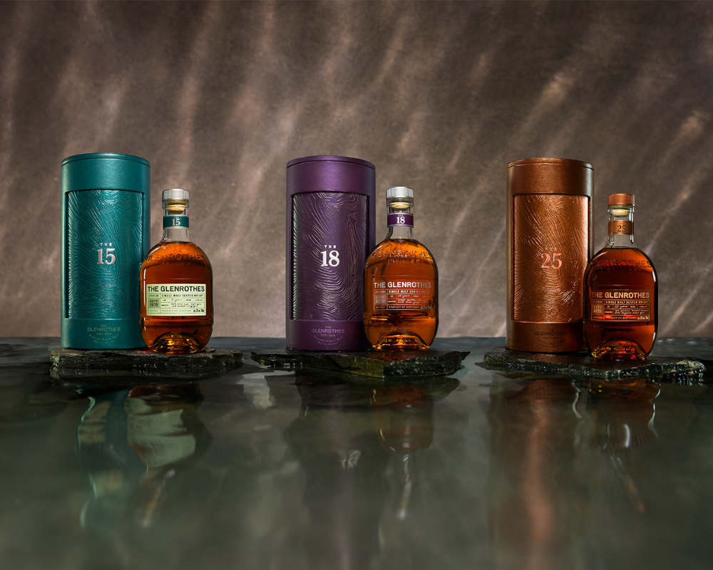 Glenrothes Flaschen mit Dose vor grau-braunem Hintergrund
